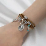 Damen western-charme-armband mit cowboy-symbolen - braun