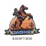 Sonnenuntergang-reitender-cowboy-bestickter-aufnaeher-1